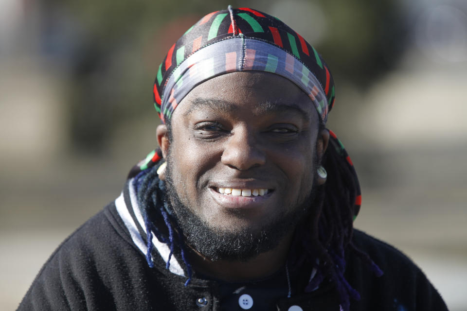 Luc Bensimon, an activist for the Black Trans Advocacy Coalition, pauses during an interview about transgender rights issues, Friday, Feb. 10, 2023, in his hometown of Topeka, Kansas. Bensimon says a bill being considered by Kansas legislators to define male and female in state law based on people's anatomy at birth will cause panic among fellow transgender people. (AP Photo/John Hanna)