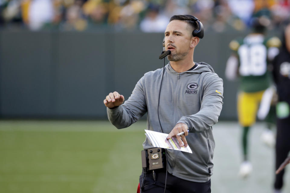 Green Bay Packers head coach Matt LaFleur directs his team during the first half of an NFL football game against the New England Patriots, Sunday, Oct. 2, 2022, in Green Bay, Wis. (AP Photo/Mike Roemer)