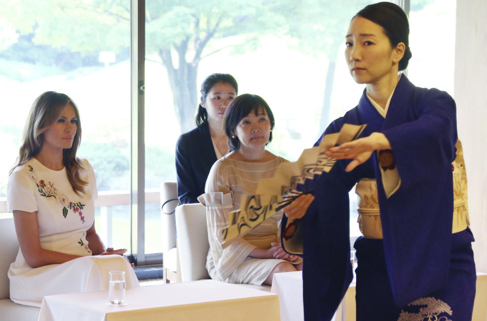 First lady Melania Trump, left, and Akie Abe, wife of Japanese Prime Minister Shinzo Abe, watch the performance of classical Japanese dancing by Yukari Onoe at Akasaka Palace in Tokyo, Monday, May 27, 2019. (AP Photo/Koji Sasahara)