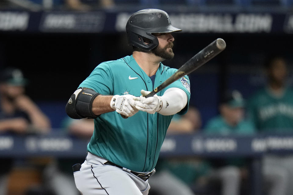 Seattle Mariners' Mike Ford lines an RBI single off Tampa Bay Rays relief pitcher Zack Littell during the second inning of a baseball game Thursday, Sept. 7, 2023, in St. Petersburg, Fla. Seattle's Eugenio Suarez scored on the hit. (AP Photo/Chris O'Meara)