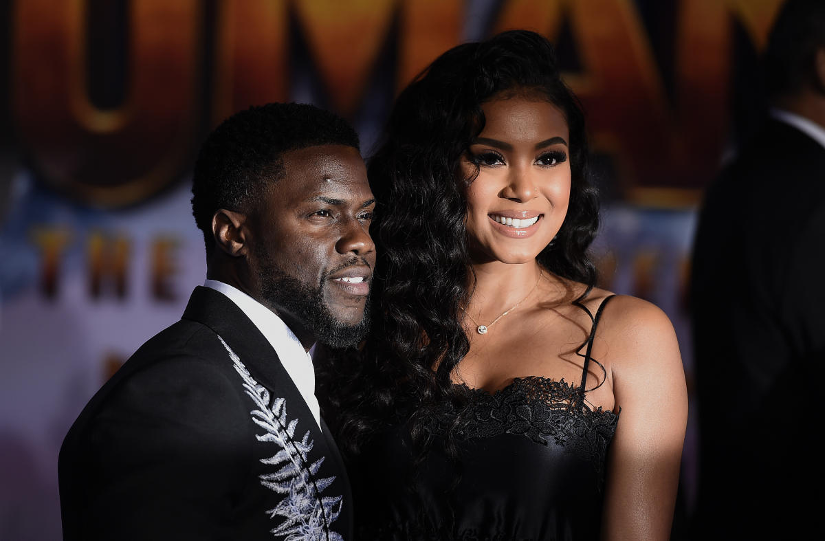 Черный голливуд. Энико Пэрриш и Кевин Харт. Kevin Hart wife. Энико ёсс. Woman holding Kevin Hart.