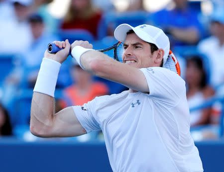 Aug 21, 2015; Cincinnati, OH, USA; Andy Murray (GBR) returns a shot against Richard Gasquet (not pictured) in the quarterfinals during the Western and Southern Open tennis tournament at the Linder Family Tennis Center. Aaron Doster-USA TODAY Sports