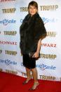 <p>A more covered up look for Melania in 2006 meant a fur throw, simple black dress and red satin Manolo Blahniks. <i>[Photo: Getty]</i> </p>