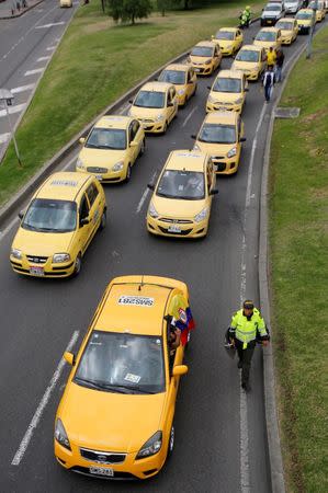 Taxi drivers protest against Uber in Bogota, Colombia, October 23, 2017. REUTERS/Jaime Saldarriaga