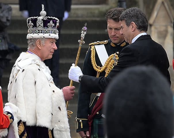<p>Sina Schuldt/picture alliance via Getty</p> The newly crowned King Charles and Major Johnny Thompson on May 6 coronation day.