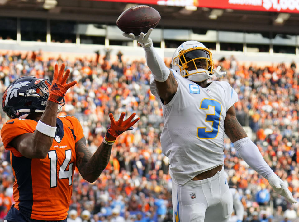 FILE - Los Angeles Chargers safety Derwin James Jr. (3) breaks up a pass intended for Denver Broncos wide receiver Courtland Sutton (14) during an NFL football game Jan. 8, 2023, in Denver. James entered the league as a first-round pick in 2018 and offers great versatility in the secondary. (AP Photo/Jack Dempsey, File)