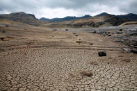 <p>A view of dried Ajuan Khota dam, a water reserve affected by drought near La Paz, Bolivia, November 17, 2016. (David Mercado/Reuters) </p>