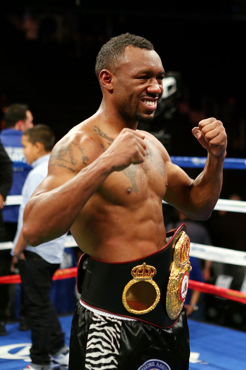 NEW YORK, NY - DECEMBER 01: Austin Trout celebrates with the belt after defeating Miguel Cotto to retain his WBA Super Welterweight Championship title at Madison Square Garden on December 1, 2012 in New York City. (Photo by Elsa/Getty Images)