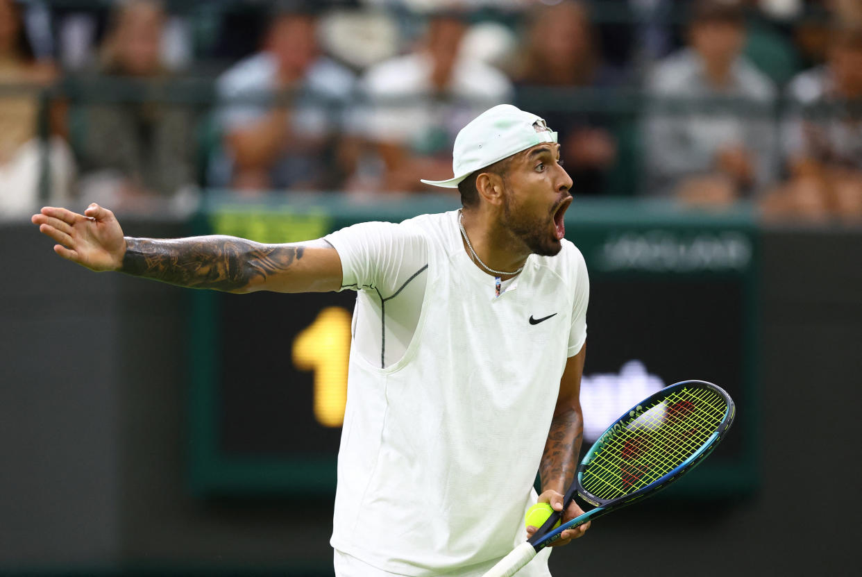 Australia's Nick Kyrgios reacts during his third round match against Greece's Stefanos Tsitsipas at Wimbledon