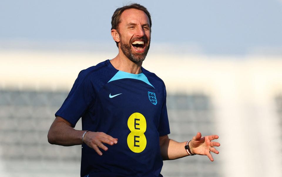 Gareth Southgate laughs at training - REUTERS/Molly Darlington