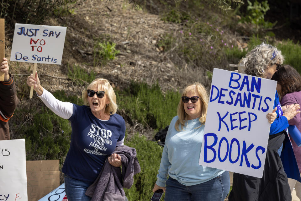 Protesters rally at the entrance to the Ronald Reagan Presidential Library in California on March 5 in opposition to Gov. DeSantis, who was scheduled to speak there.