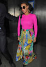 Celebrity fashion: Beyonce isn’t fearful of bright fashion! She’s one of the few celebs who can pull of such a look and she does so with aplomb. Clad in a Michael Kors pink sweater with an abstract-print skirt by Etro she’s ready for summer!