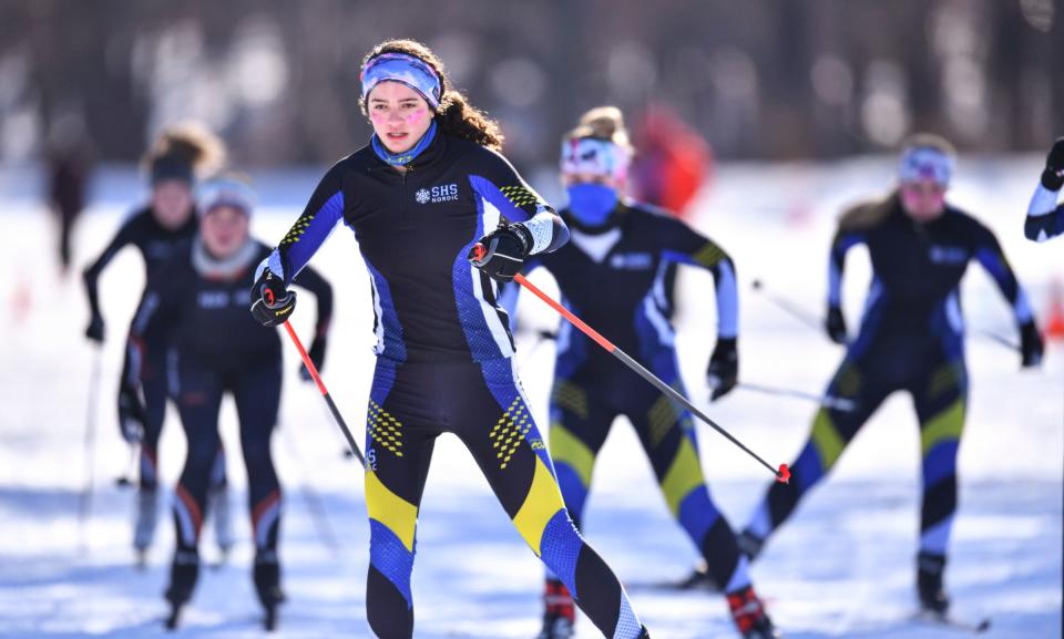 Competitors begin the girls varsity race during the Nordic ski meet Thursday, Jan. 28, 2021, at Riverside Park in St. Cloud. 