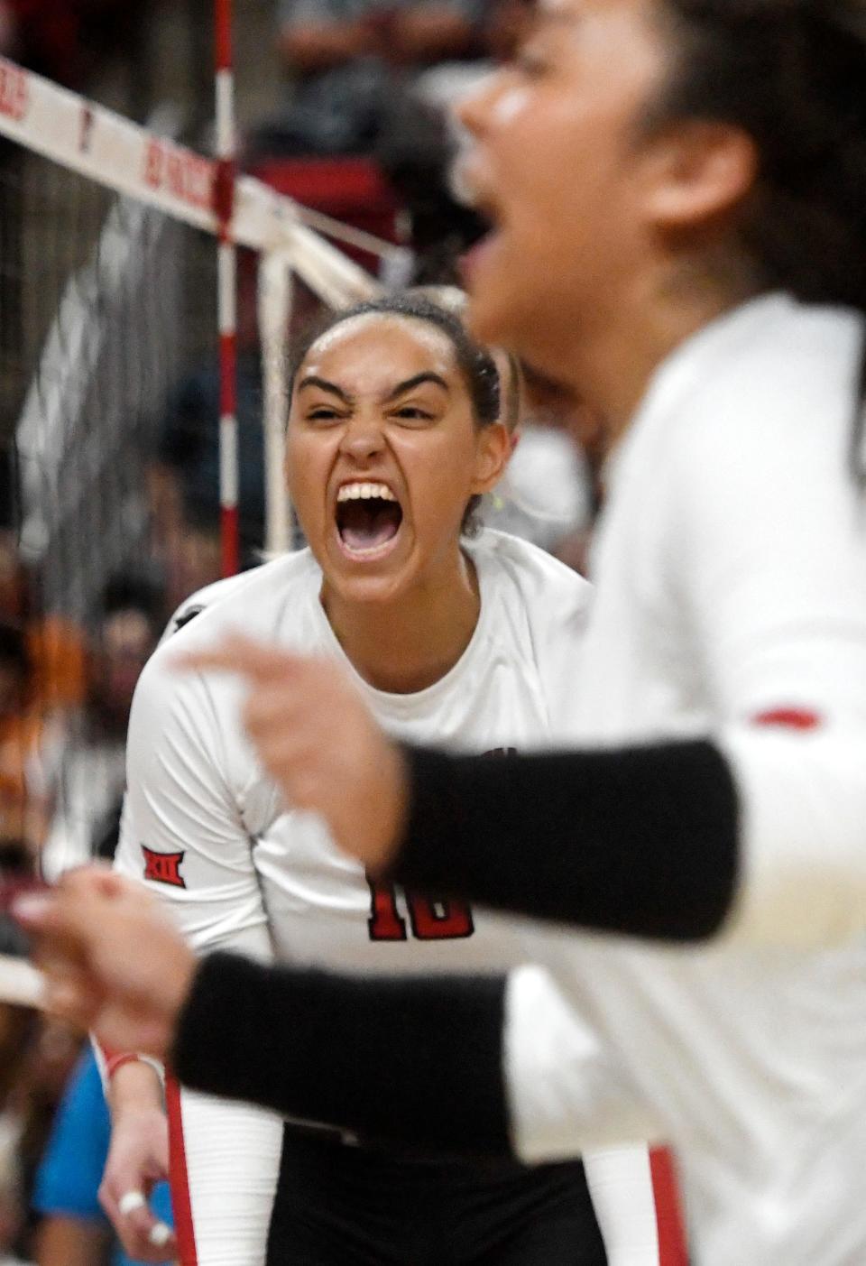 Texas Tech's Reese Rhodes reacts to a winning point against Texas during a Big 12 volleyball match, Sunday, Oct. 2, 2022, at United Supermarkets Arena.