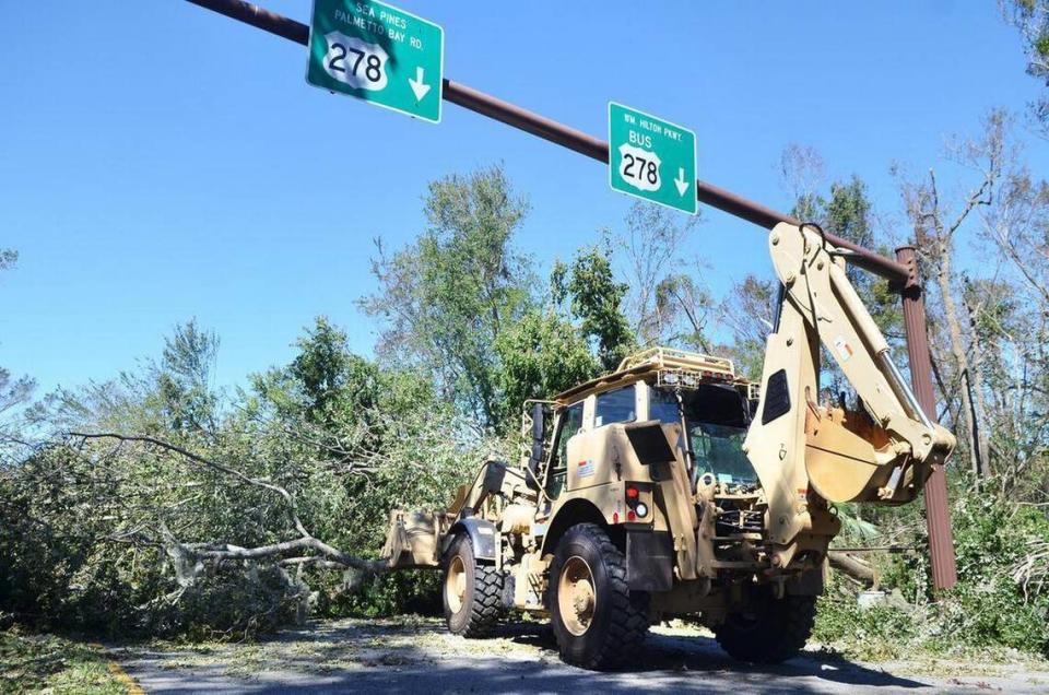 The 1263rd Forward Support Company of the S.C. Army National Guard was tasked with removing trees that had fallen across U.S. 278 from Buckwalter Parkway in Bluffton to Pope Avenue on Hilton Head due to Hurricane Matthew. Here, they clear a tree brought down across Pope Avenue on Oct. 9, 2016, the day after the hurricane struck.