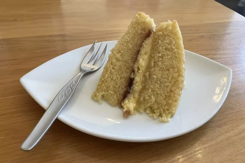 A slice of Homemade Victoria sponge cake