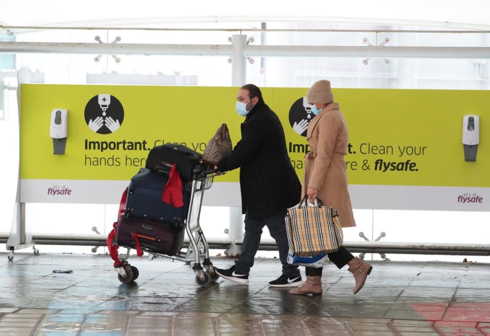 Passengers at Edinburgh airport (Andrew Milligan/PA) (PA Archive)