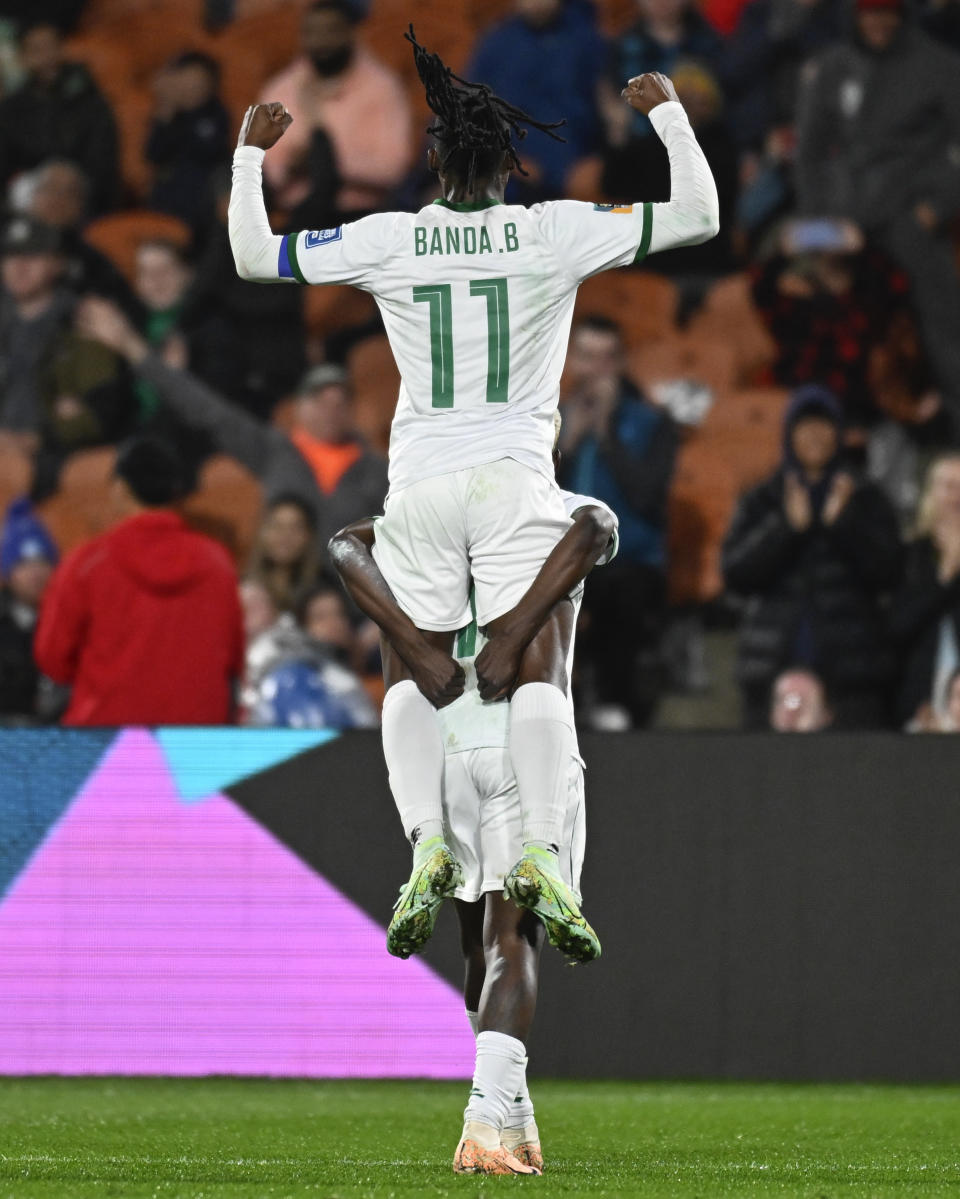 Goal scorer Zambia's Racheal Kundananji carries teammate Barbra Banda as they celebrate their third goal during the Women's World Cup Group C soccer match between Costa Rica and Zambia in Hamilton, New Zealand, Monday, July 31, 2023. (AP Photo/Andrew Cornaga)