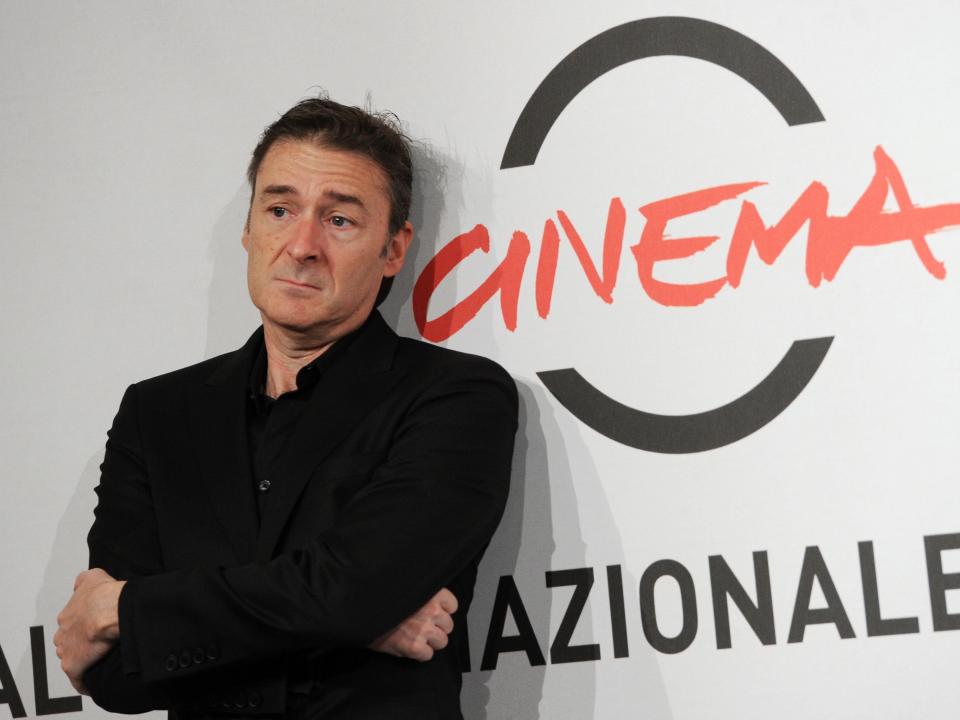 Director P.J. Hogan wearing black suit at photocall of the film 'Mental' during the 7th Rome Film Festival on November 2012.