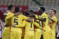 Barcelona players celebrate after winning the Spanish Copa del Rey final 2021 against Athletic Bilbao at La Cartuja stadium in Seville, Spain, Saturday April 17, 2021. (AP Photo/Angel Fernandez)