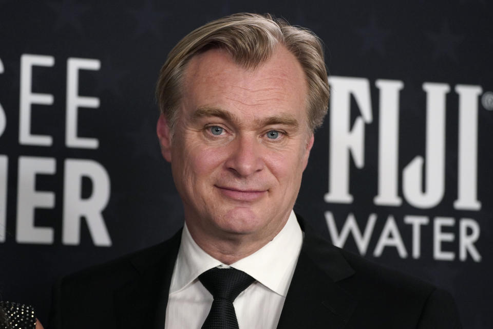 Christopher Nolan poses in the press room with the award for best picture for "Oppenheimer" during the 29th Critics Choice Awards on Sunday, Jan. 14, 2024, at the Barker Hangar in Santa Monica, Calif. (Photo by Jordan Strauss/Invision/AP)