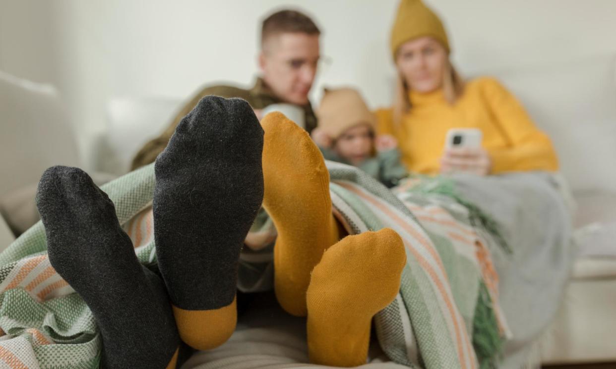 <span>Electric blankets and heated throws cost between $10 and $60 to run over winter, making them much more affordable than electric space heaters.</span><span>Photograph: Westend61/Getty Images</span>