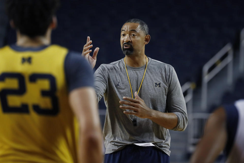 Michigan head basketball coach Juwan Howard attends an open practice, Thursday, Oct. 17, 2019, in Ann Arbor, Mich. Michigan held its men's basketball media day Thursday, another first for Howard as he prepares for his initial season at the helm. The former Fab Five star returned to his school after coach John Beilein left for the NBA this offseason. (AP Photo/Carlos Osorio)