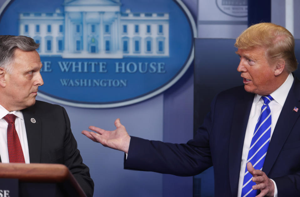 President Donald Trump interacts with acting Health and Human Services Under Secretary for Science and Technology William Bryan during the daily coronavirus task force briefing at the White House in Washington, U.S., April 23, 2020. (Jonathan Ernst/Reuters)