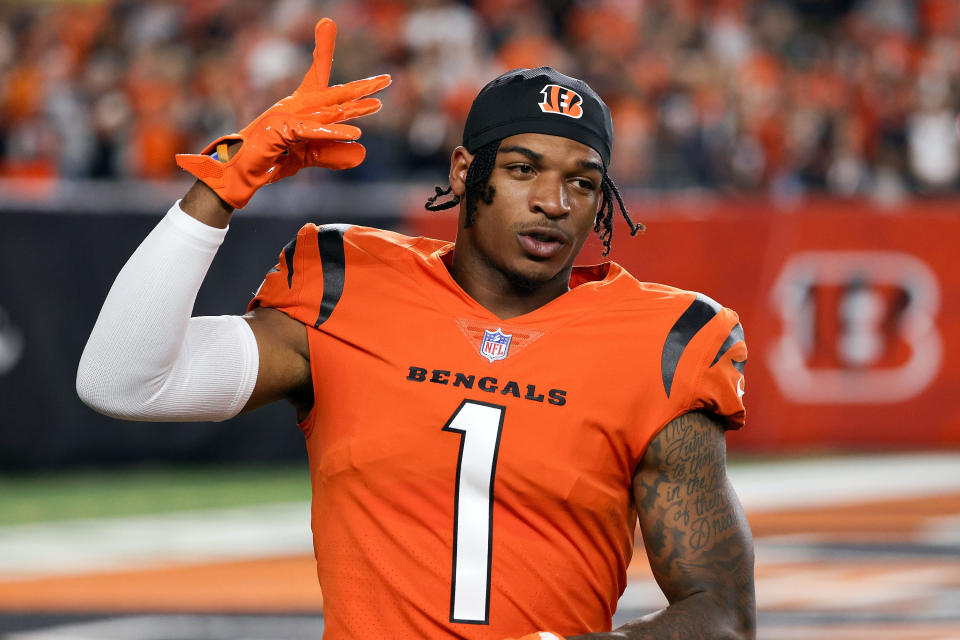 Helmetless Ja'Marr Chase in an orange Bengals uniform