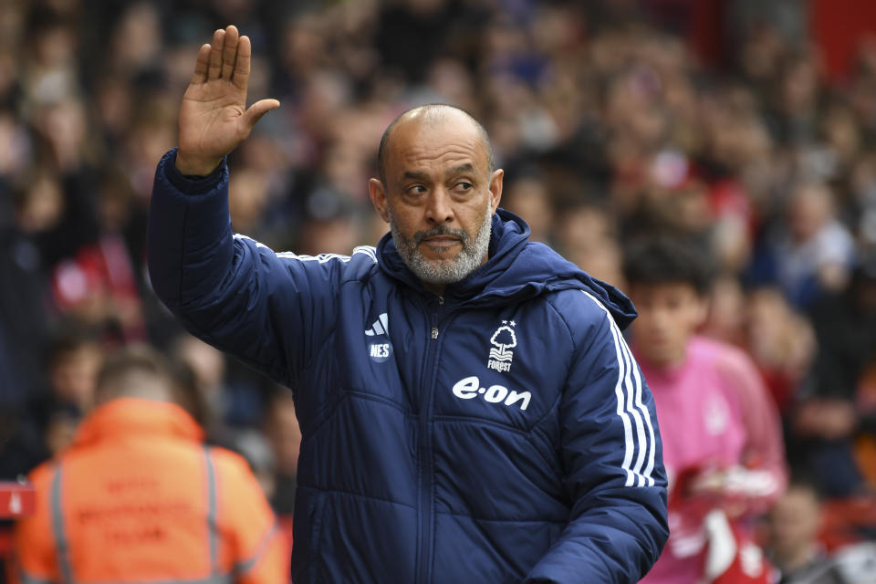 Nottingham Forest's head coach Nuno Espirito Santo waves fans prior to the English Premier League soccer match between Nottingham Forest and Manchester City at the City Ground stadium in Nottingham, England, Sunday, April 28, 2024. (AP Photo/Rui Vieira)