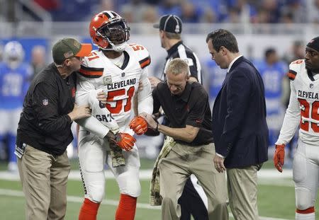 Nov 12, 2017; Detroit, MI, USA; Cleveland Browns outside linebacker Jamie Collins (51) in pain with an injury during the first quarter against the Detroit Lions at Ford Field. Raj Mehta-USA TODAY Sports