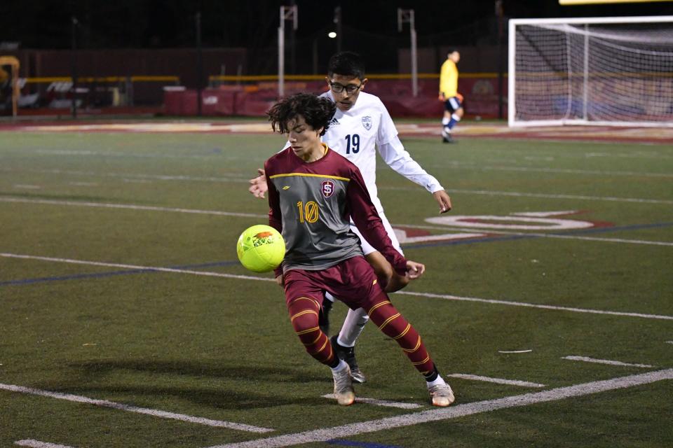 Simi Valley sophomore winger Angel Orozco keeps possession in the 4-1 win over St. Genevieve on Dec. 29.