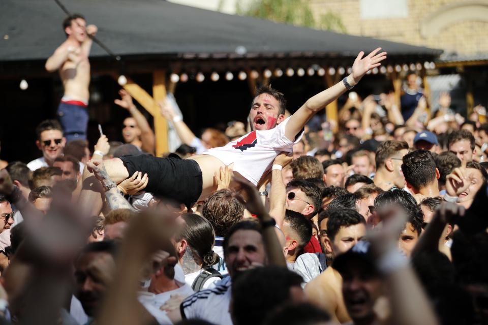 Crowd surfing, just without the music.