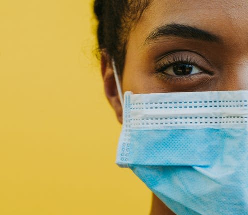   <span class="attribution"><a class="link " href="https://www.shutterstock.com/image-photo/african-american-woman-wearing-medical-mask-1793657722" rel="nofollow noopener" target="_blank" data-ylk="slk:oneinchpunch/Shutterstock;elm:context_link;itc:0;sec:content-canvas">oneinchpunch/Shutterstock</a></span>