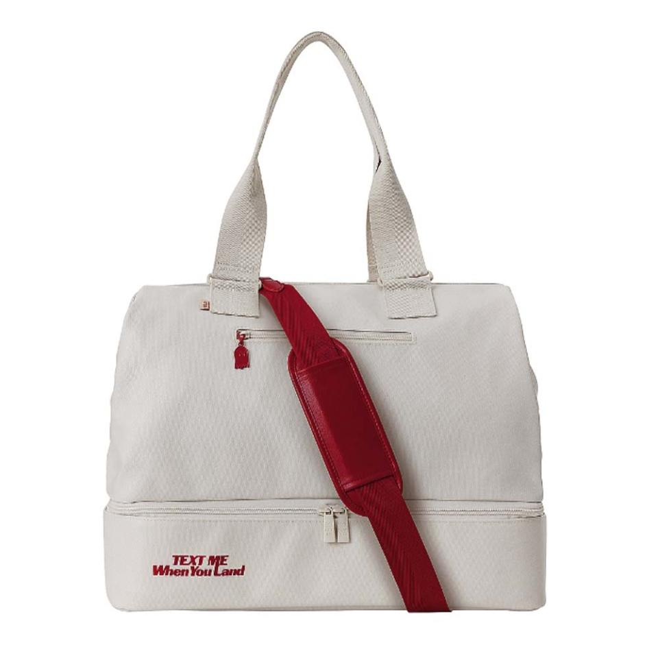 white tote bag with red strap