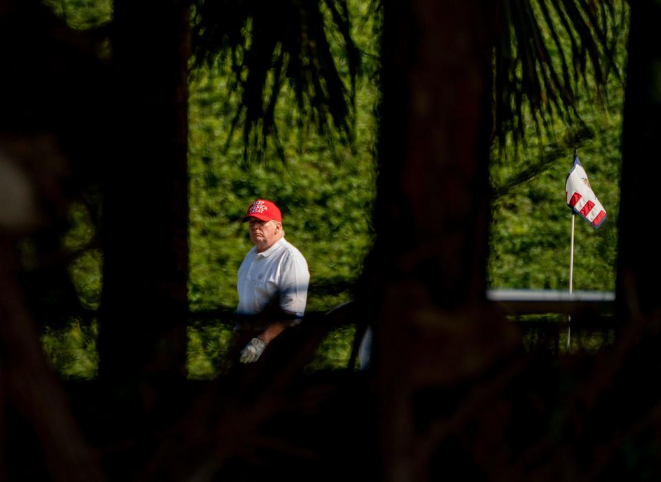 President Donald Trump plays at his Trump International Golf Club in suburban West Palm Beach on Dec. 28, 2020. (Greg Lovett/Palm Beach Post)