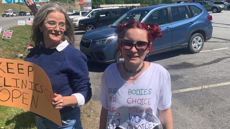 "She still went through with it and organized in a cohesive kind of way. She wasn't easily deterred," said Madison Early College High School English teacher Dusty Josefiak, left, of freshman Rose Jeffrey, right, who initiated a May 11 women's rights rally.