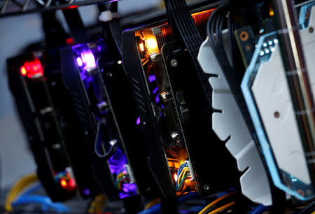 High-end graphic cards are installed in a cryptocurrency mining computer at a computer mall in Hong Kong, China January 29, 2018. Picture taken January 29, 2018. REUTERS/Bobby Yip