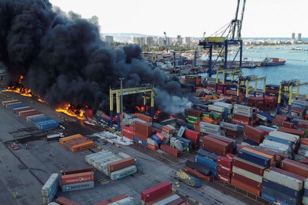 PHOTO: Smoke rises from burning containers at the port in the earthquake-stricken town of Iskenderun, Turkey, Feb. 7, 2023. (Benoit Tessier/Reuters)