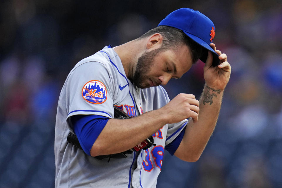 New York Mets starting pitcher Tylor Megill collects himself on the mound during the first inning of the team's baseball game against the Pittsburgh Pirates in Pittsburgh, Friday, June 9, 2023. (AP Photo/Gene J. Puskar)