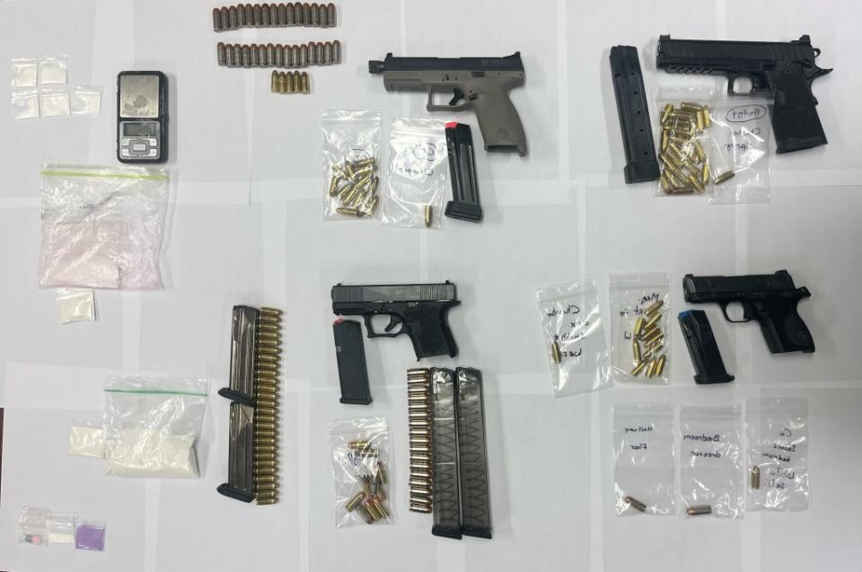 Guns, drugs, ammo and scales were all recovered inside the Bronx home.