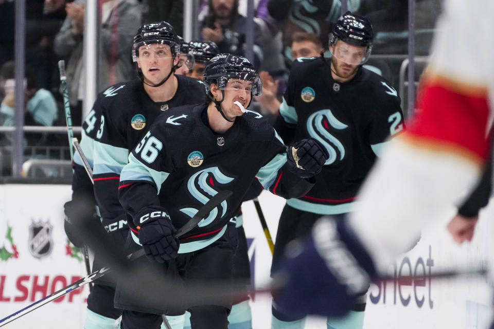 Seattle Kraken right wing Kailer Yamamoto (56) reacts after scoring against the Florida Panthers during the second period of an NHL hockey game Tuesday, Dec. 12, 2023, in Seattle. (AP Photo/Lindsey Wasson)