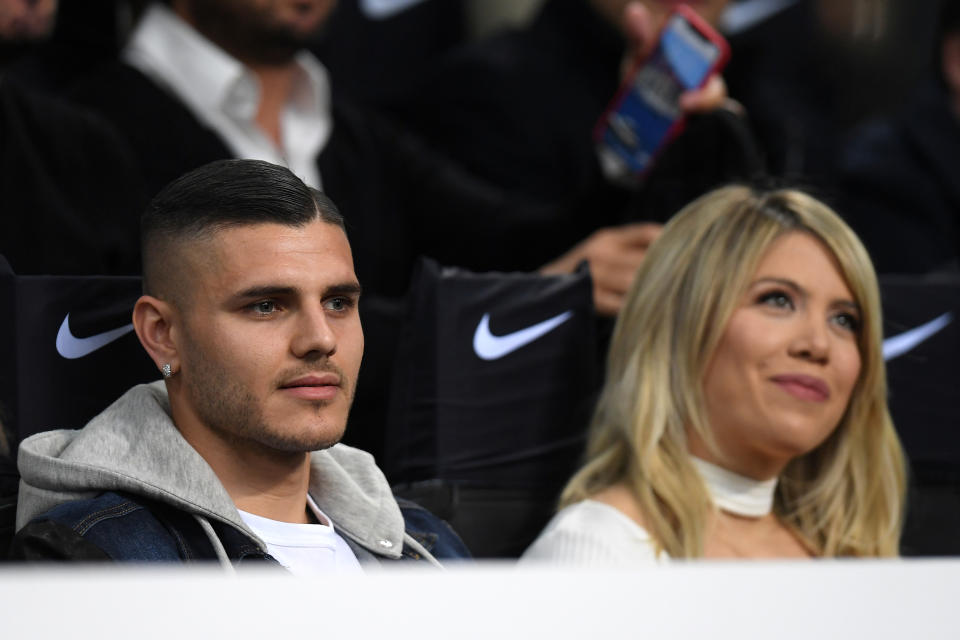 Soccer Football - Serie A - Inter Milan v Lazio - San Siro, Milan, Italy - March 31, 2019   Inter Milan&#39;s Mauro Icardi and his wife, Wanda Nara, sat in the stands before the match    REUTERS/Daniele Mascolo