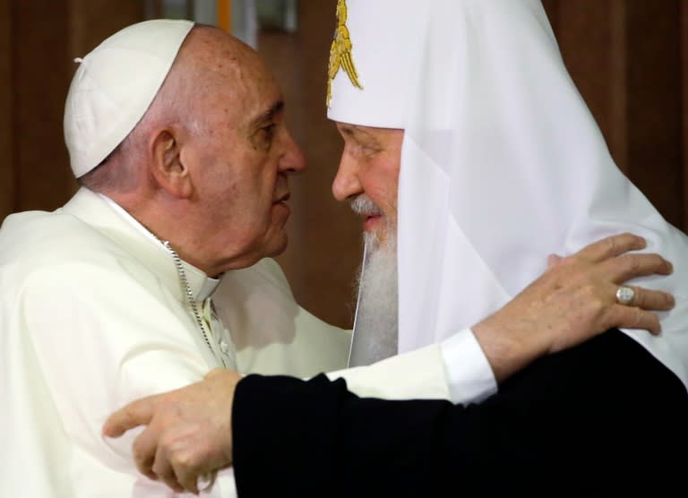 Pope Francis (left) and the head of the Russian Orthodox Church, Patriarch Kirill, embrace during a historic meeting in Havana, on February 12, 2016