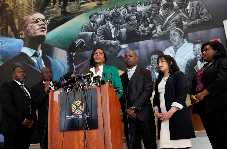 Ilyasah Shabazz (C), daughter of African-American activist Malcolm X, speaks alongside civil rights attorney Ben Crump (L) and co-counsel Ray Hamlin (C, R) during a press conference in New York on February 21, 2023 at the Malcolm X & Dr. Betty Shabazz Memorial and Educational Center, formerly known as the Audubon Ballroom, where Malcolm X was shot dead at 39 on Feb. 21, 1965.<span class="copyright">Timothy A. Clary–AFP via Getty Images</span>