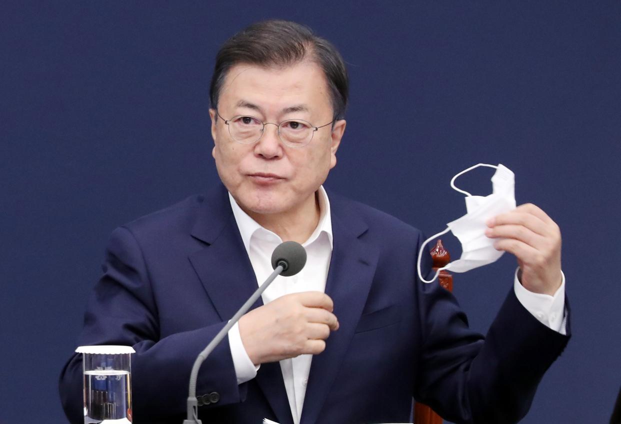 <p>President Moon Jae-in during a meeting with his senior secretaries at the presidential office Cheong Wa Dae in Seoul</p> (EPA)