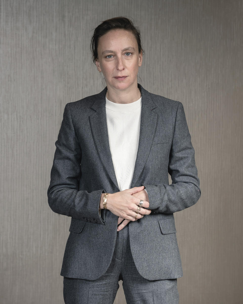 FILE - This Sept. 30, 2019, file photo shows filmmaker Celine Sciamma posing for a portrait in New York to promote her film, "Portrait of a Lady on Fire." The emotions stirred up by the film have been considerable since its debut at last May's Cannes Film Festival. There, it won best screenplay and Sciamma became the first female director to win the Queer Palme, an award given to the best LGBTQ-themed film across the festival. (Photo by Christopher Smith/Invision/AP, File)