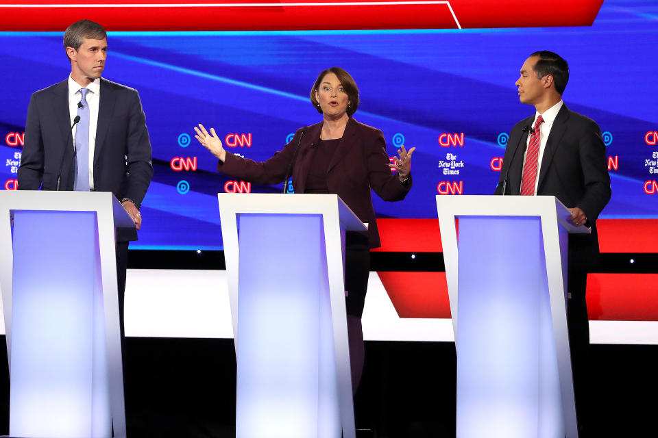 (L-R) Former Texas congressman Beto O'Rourke, Sen. Amy Klobuchar (D-MN) and former housing secretary Julian Castro participate in the Democratic Presidential Debate at Otterbein University on Oct. 15, 2019 in Westerville, Ohio. | Win McNamee—Getty Images