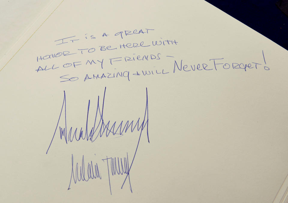 The message written by U.S. President Trump is seen in the Yad Vashem Holocaust Museum guestbook