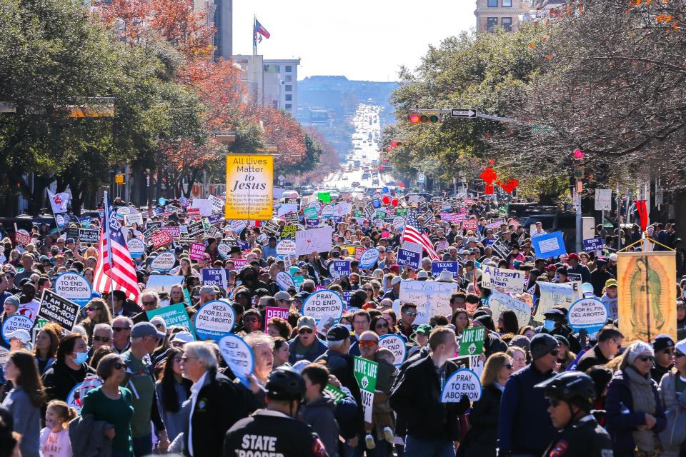 Thousands of abortion opponents march down Congress Avenue towards the Texas Capitol for the Texas Rally for Life in Austin, Texas on Jan. 22, 2022.